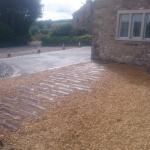 granite flooring and artificial sleepers footpath