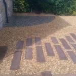 granite flooring and artificial sleepers footpath